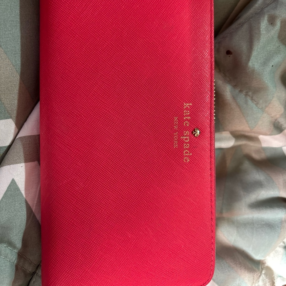 Kate Spade Cherry Lane leather bifold wallet in Surpriseco color
